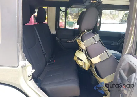 2015 Jeep Wrangler Unlimited Sport z USA, uszkodzony, nr VIN 1C4BJWDG7FL543157